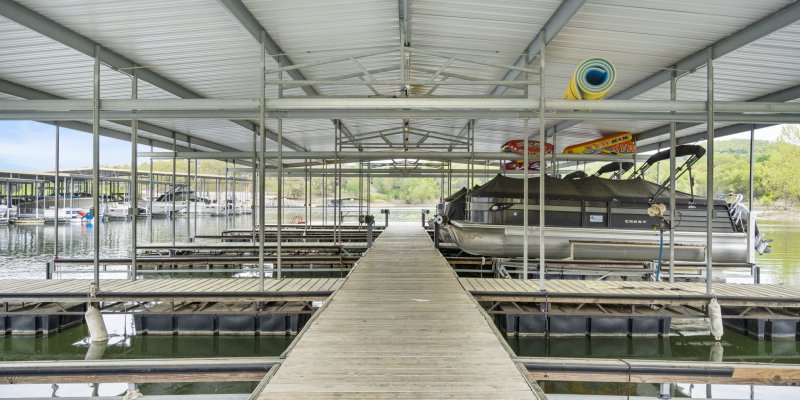 Large covered dock with pontoon